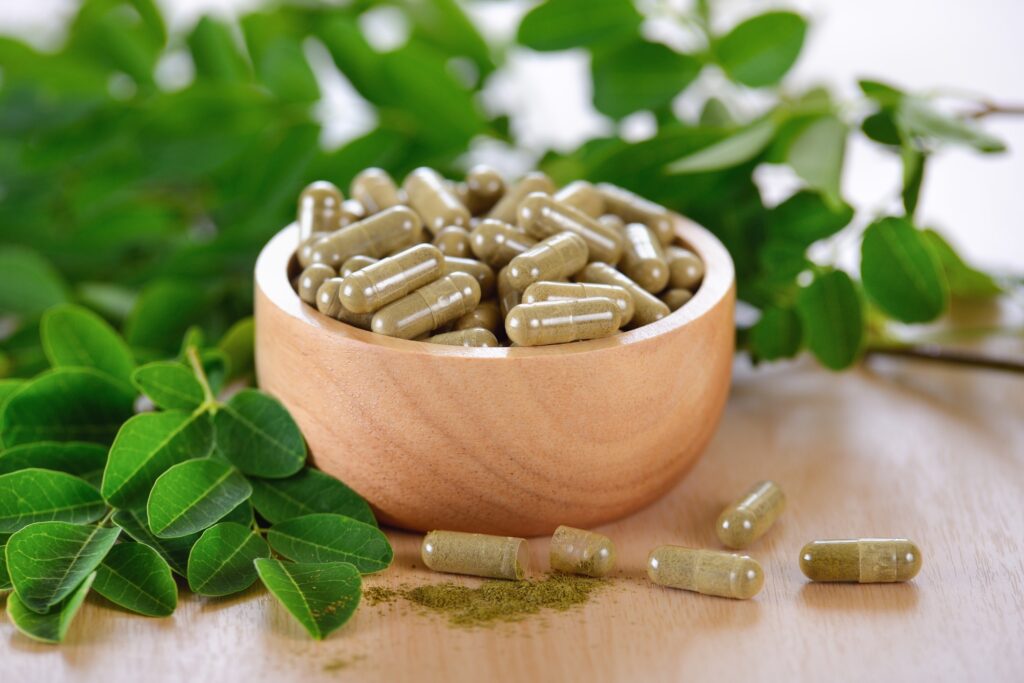 Moringa leaves and capsules (Herbs for health)